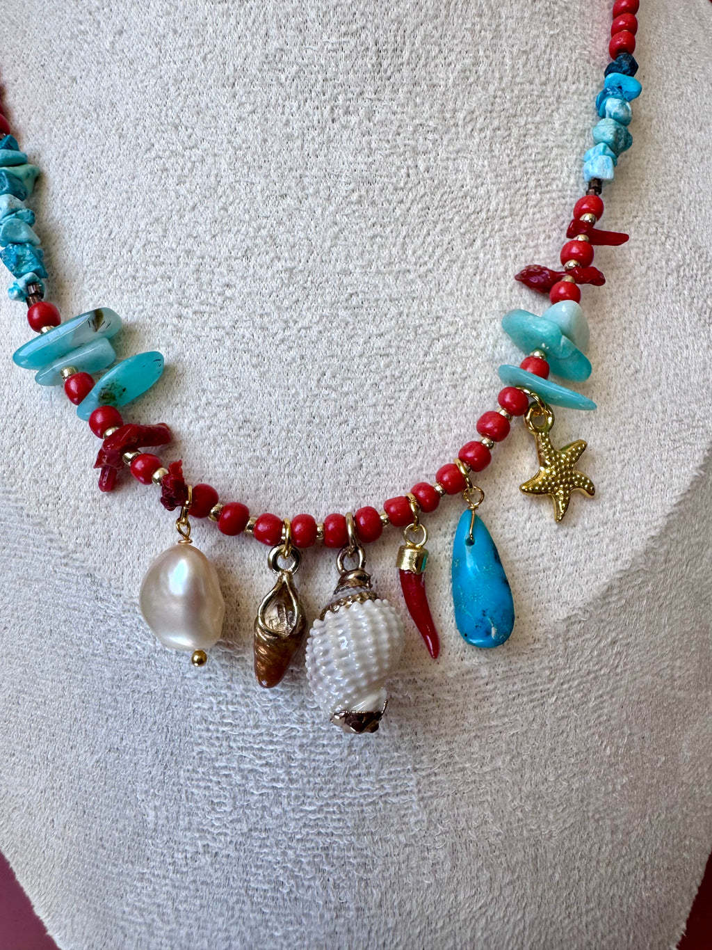 Collana charms conchiglia con corno