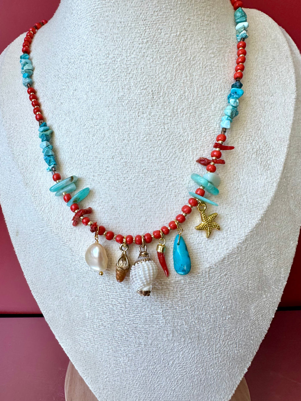 Collana charms conchiglia con corno